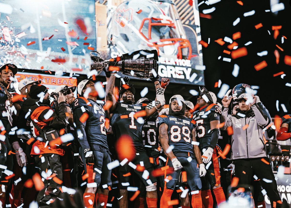 Montreal raising the Grey Cup trophy after winning it in 2023.