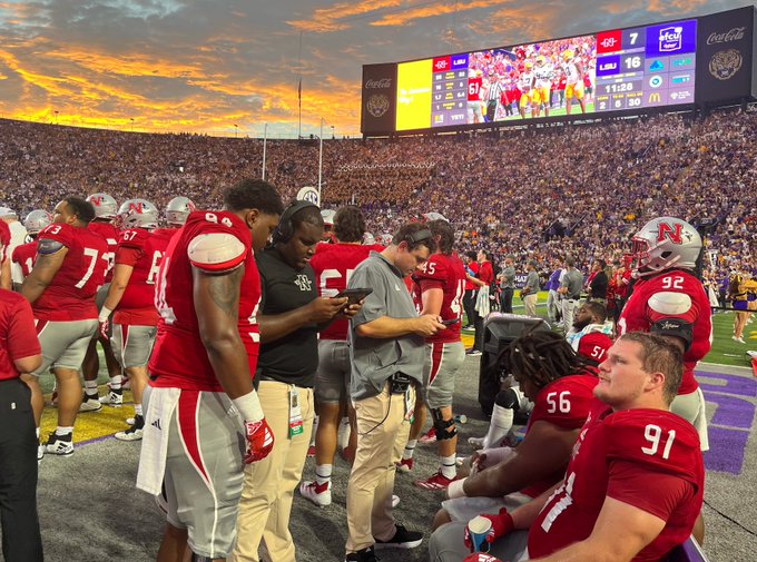 Coach reviewing replay on sideline